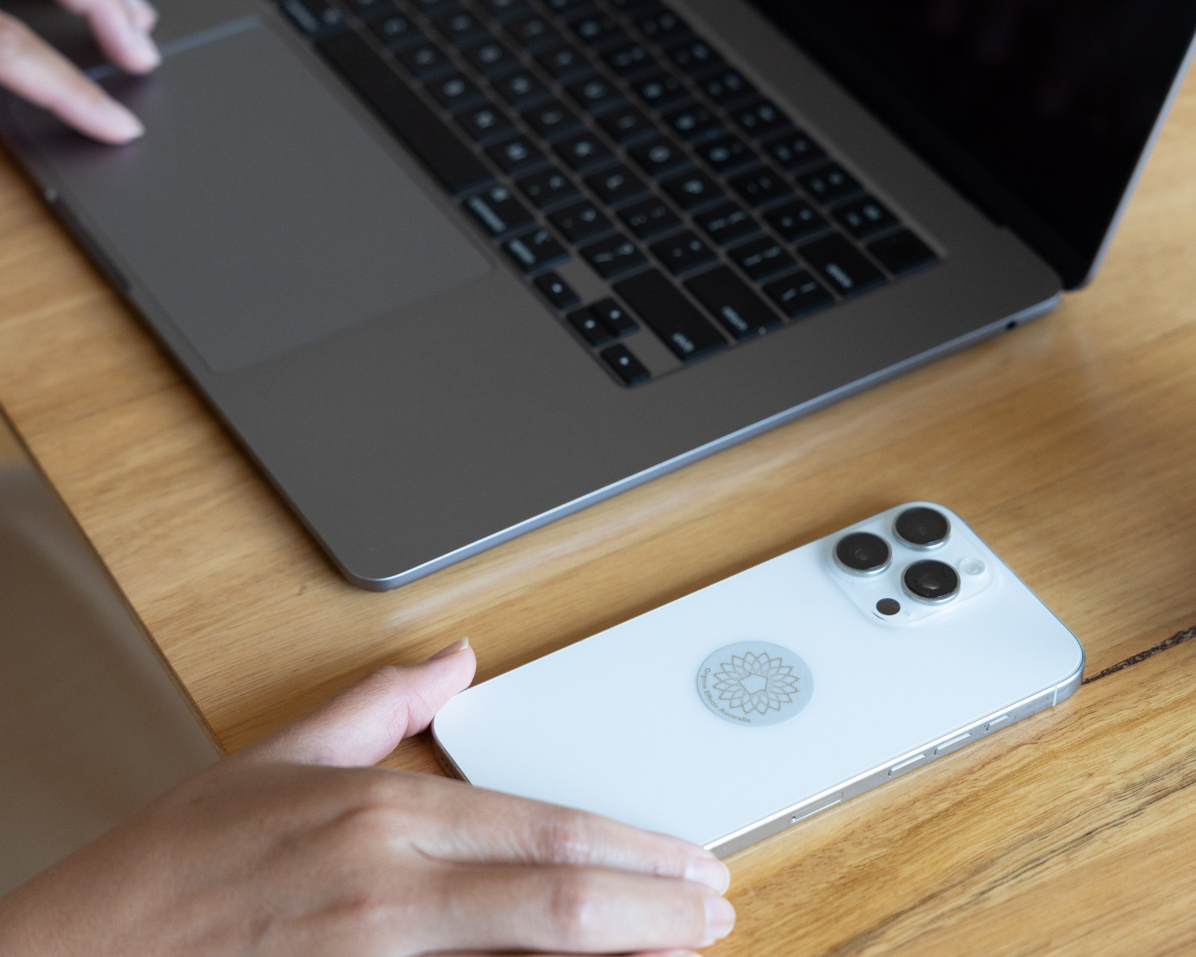 Mobile Phone Radiation Harmoniser with laptop